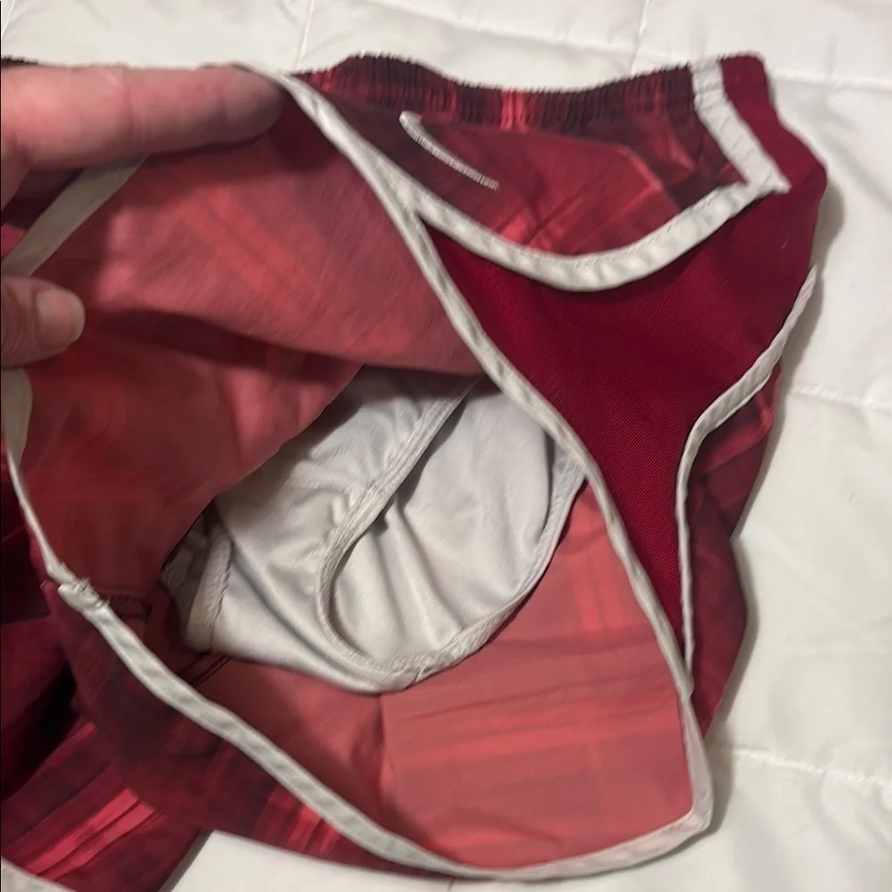 Nike Red Athletic Shorts with Plaid Design